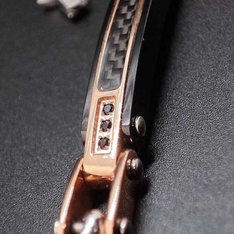 Bracciale Uomo BOCCADAMO MAN in acciaio PVD oro rosa e Piastrina centrale con Zirconi neri