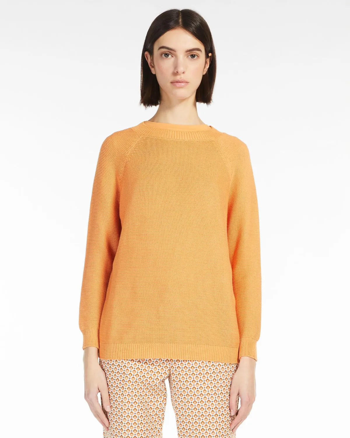 Maglia color mango in puro cotone punto riso con maniche raglan