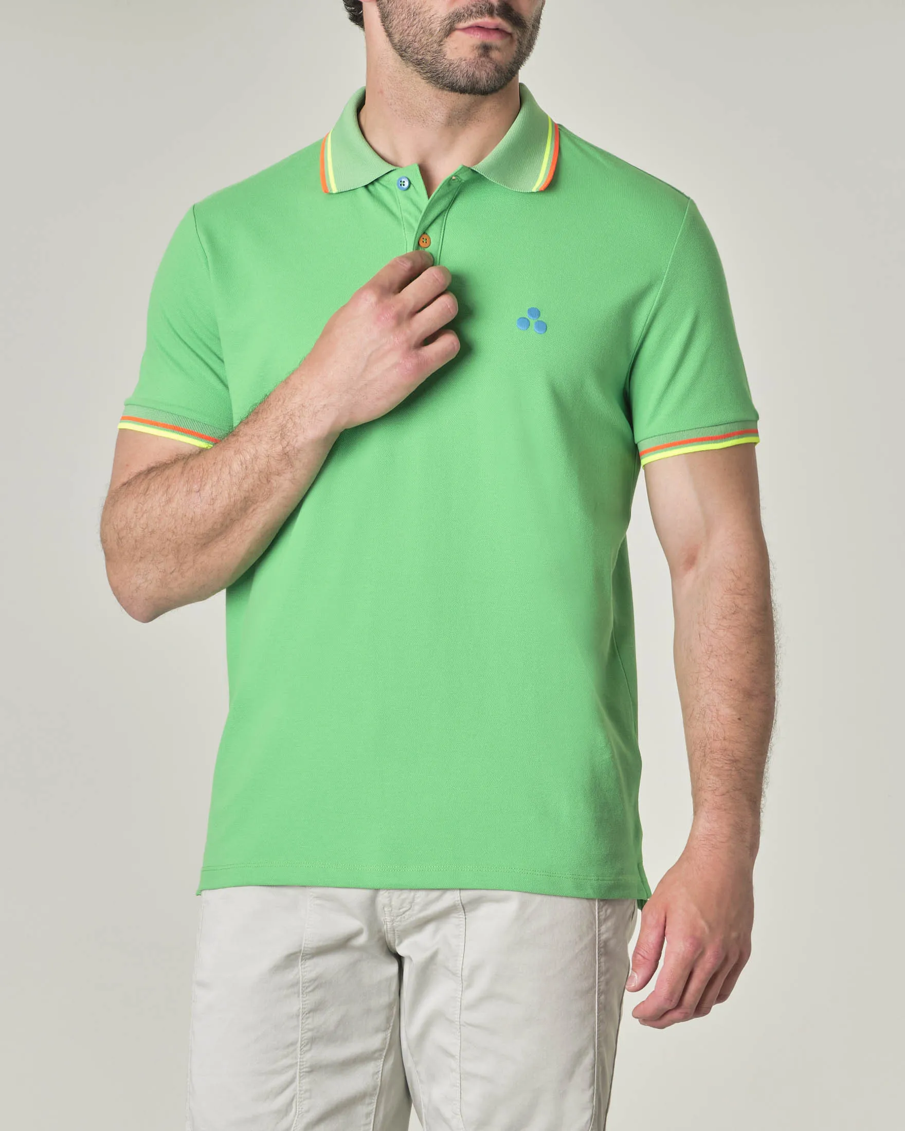 Polo verde menta a mezza manica in piqué di cotone stretch con logo e bordino fluorescenti