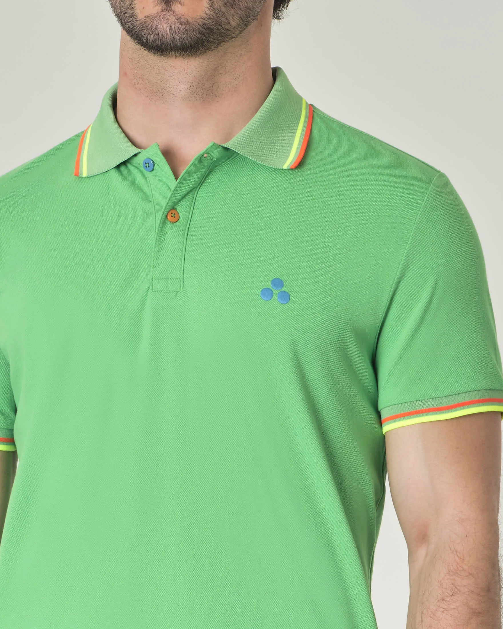 Polo verde menta a mezza manica in piqué di cotone stretch con logo e bordino fluorescenti