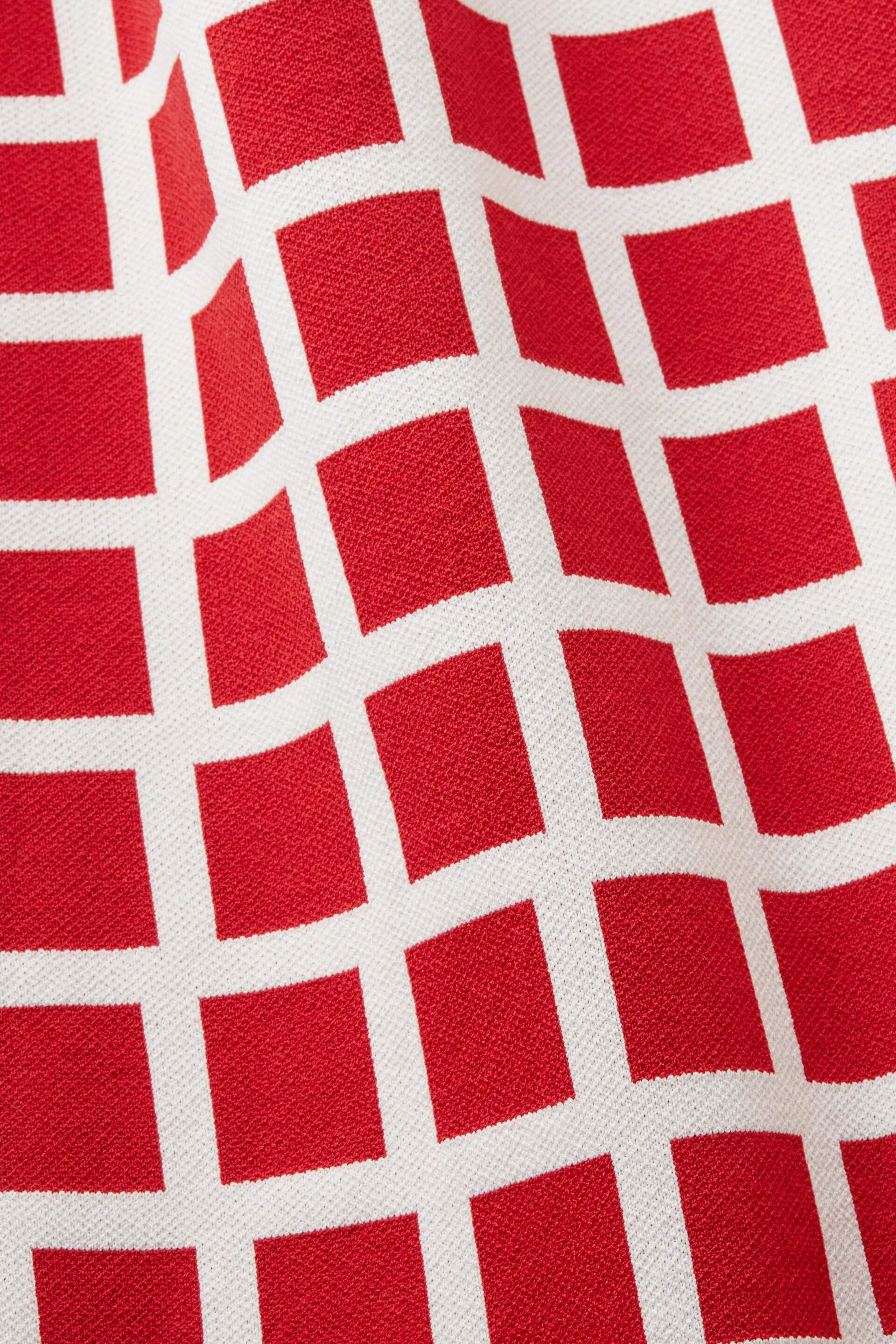 Pullover cropped in jacquard a maniche corte
