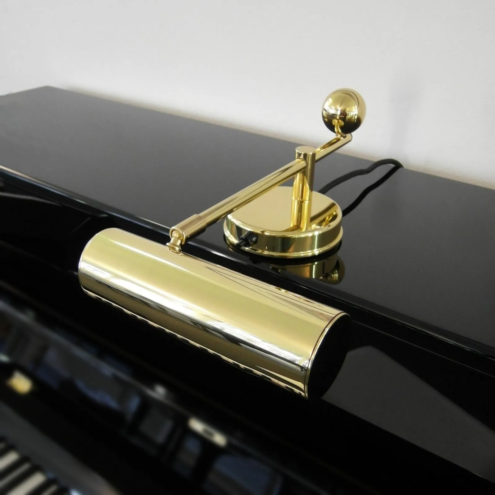 TECNOLUMEN Pianoforte a luce fissa in ottone it
