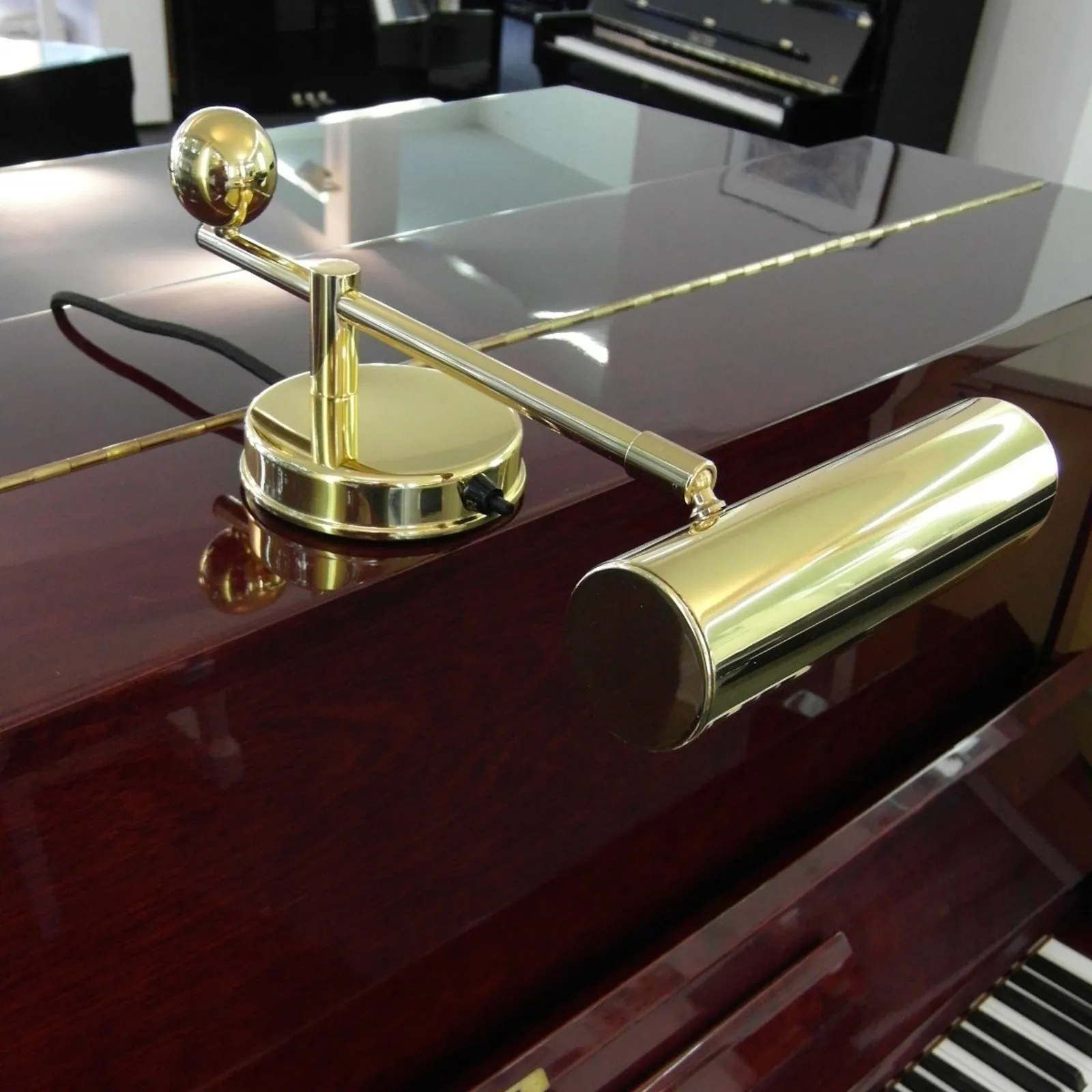 TECNOLUMEN Pianoforte a luce fissa in ottone it