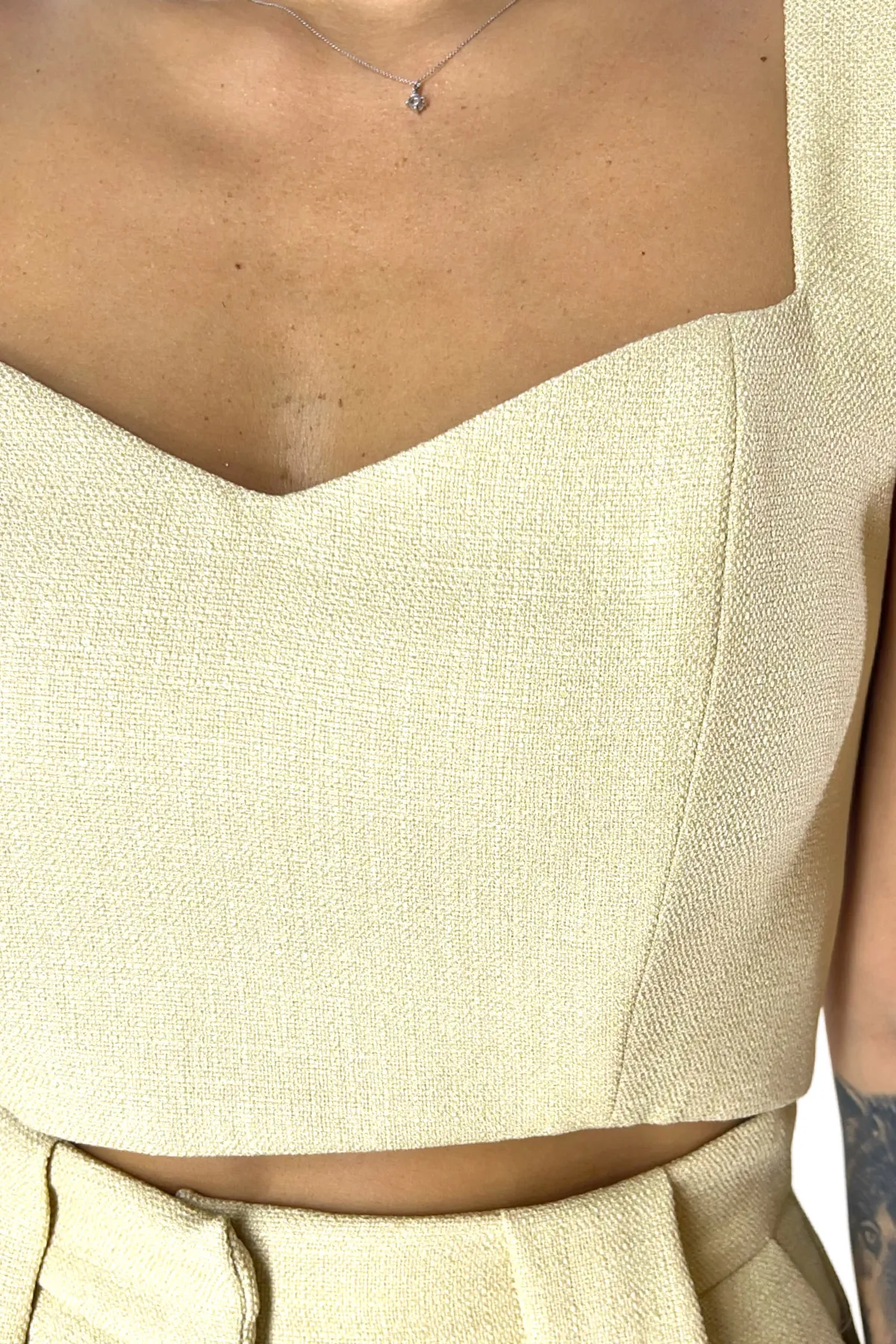 Top donna corto in lino bretella larga steccato sul seno effetto bustier cerniera retro