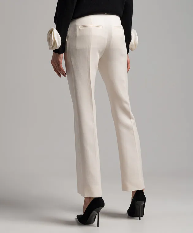 Valentino Pantaloni a zampa di crêpe Couture bianchi con logo metallico 4B3RB3681CF
